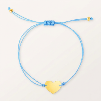 9 1/4 inch Blue Cord Adjustable Bracelet with 14k yellow Gold Heart