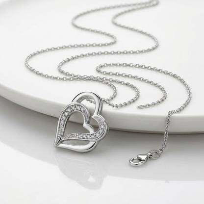 Sterling Silver Dual Heart Motif Pendant with Diamonds (.06 cttw)